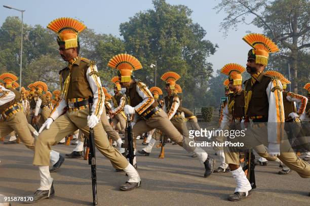 Indo-Tibetan Border Police practice stretching excercises while rehearsing for the upcoming 69th Republic Day Parade in New Delhi on January 13, 2018.