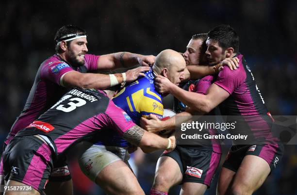 Carl Ablett of Leeds Rhinos is tackled by Ben Kavanagh of Hull KR during the Betfred Super League match between Leeds Rhinos and Hull KR at Elland...