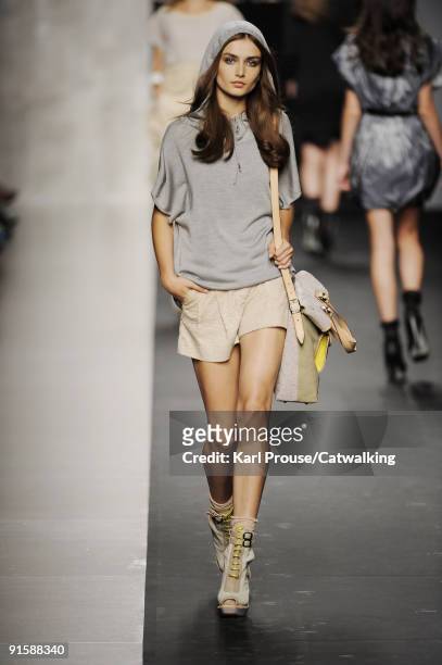 Model walks the runway during the Sportmax Spring Summer 2010 Ready To Wear show as part of the Milan Womenswear Fashion Week Spring/Summer 2010 at...
