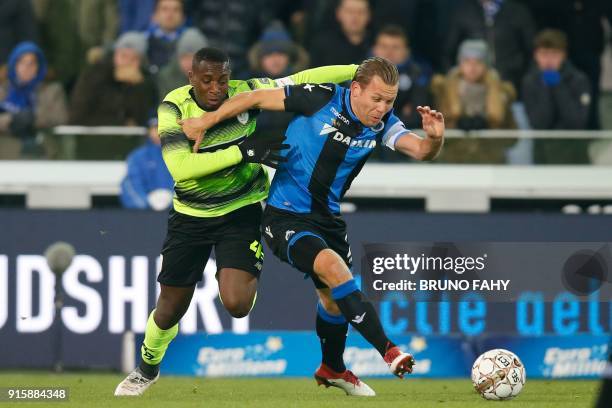Standard's Paul-Jose M'Poku Ebunge and Club's Ruud Vormer vie during a between Club Brugge KV and Standard de Liege football match, the return leg of...