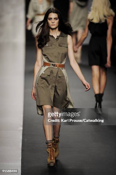 Model walks the runway during the Sportmax Spring Summer 2010 Ready To Wear show as part of the Milan Womenswear Fashion Week Spring/Summer 2010 at...