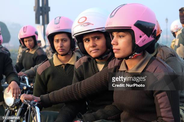 India's Border Security Force &quot;Daredevils&quot; women motorcycle riders sit in formation during a rehearsal for the Republic Day parade on a...