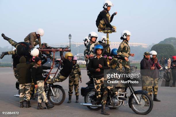 India's Border Security Force &quot;Daredevils&quot; women motorcycle practice formation during a rehearsal for the Republic Day parade on a cold...