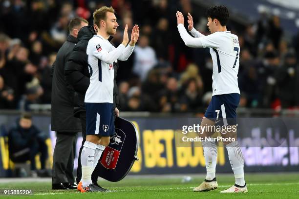 Tottenham Hotspur's Son Heung-Min is substituted for Christian Eriksen during the FA Cup Fourth Round replay match between Tottenham Hotspur and...