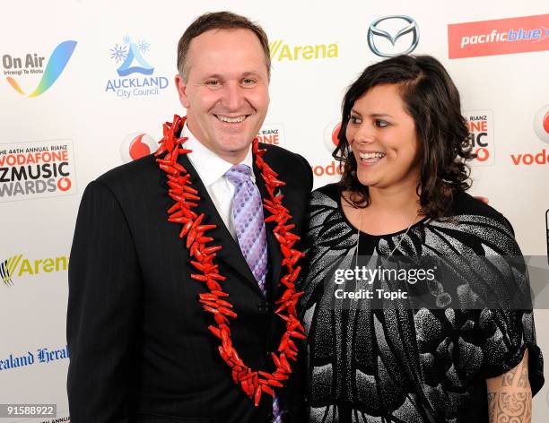 Prime Minister John Key of New Zeeland and Anika Moa pose during the 2009 Vodafone Music Awards at Vector Arena on October 8, 2009 in Auckland, New...