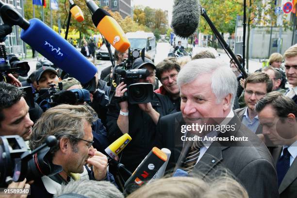 Leader of the Bavarian Christian Democrats Horst Seehofer gives a statement to journalists after the second round of coalition negotiations between...