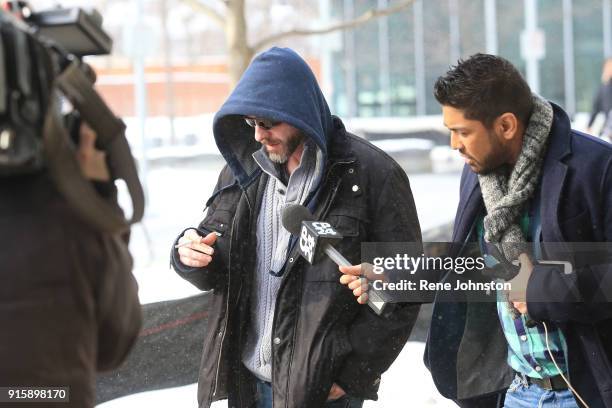 Todd McArthur Todd McArthur, son of Bruce McArthur, leaves court in Oshawa court today 150 Bond St East . Oshawa.February 8, 2018.