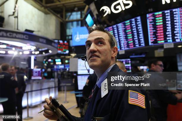 Traders work on the floor of the New York Stock Exchange moments before the Closing Bell on February 8, 2018 in New York City. As Wall Street...