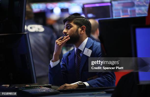 Traders work on the floor of the New York Stock Exchange moments before the Closing Bell on February 8, 2018 in New York City. As Wall Street...