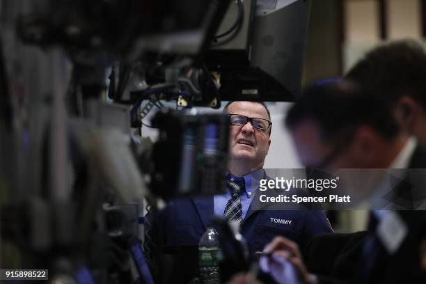 Traders work on the floor of the New York Stock Exchange moments before the Closing Bell on February 8, 2018 in New York City. As Wall Street...