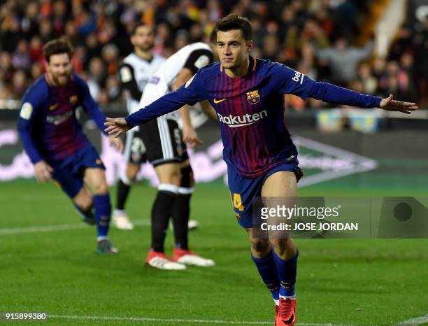 Barcelona's Brazilian midfielder Philippe Coutinho celebrates a goal during the Spanish 'Copa del Rey' second leg semi-final football match between...