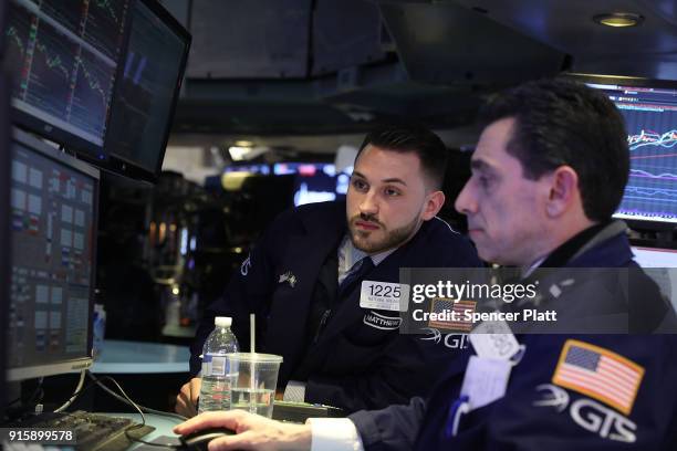 Traders work on the floor of the New York Stock Exchange moments before the Closing Bell on February 8, 2018 in New York City. As Wall Street...