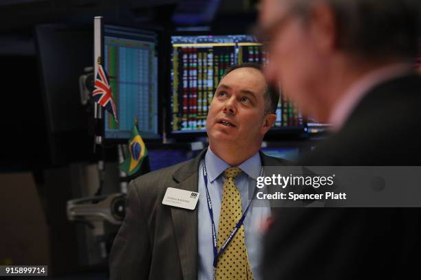 Traders work on the floor of the New York Stock Exchange moments before the Closing Bell on February 8, 2018 in New York City. As Wall Street...