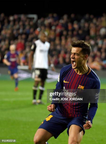 Barcelona's Brazilian midfielder Philippe Coutinho celebrates a goal during the Spanish 'Copa del Rey' second leg semi-final football match between...