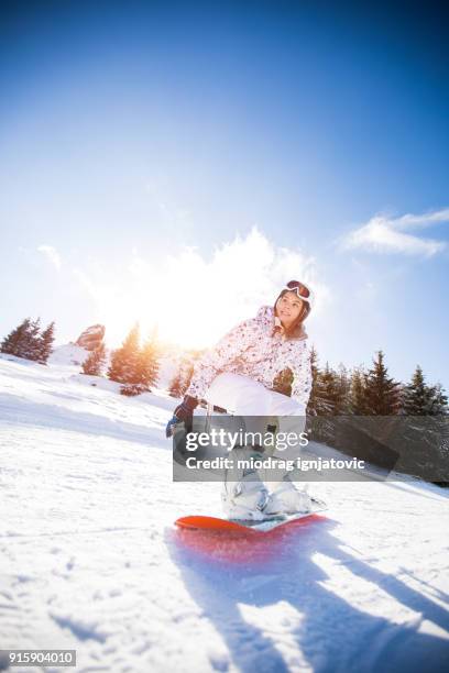 snowboarding downhill - professional skiers stock pictures, royalty-free photos & images