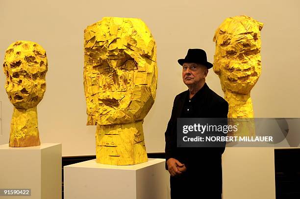 German artist Georg Baselitz poses in front of his wooden sculptures "Dresdner Frauen" on October 8, 2009 in the "Gemaeldegalerie Alte Meister" at...