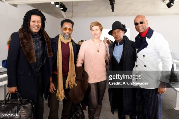 Ty-Ron Mayes, Carlton Jones, Claudia Paul, Jamal Abdourahman and Alton Barber pose backstage at the Global Fashion Collective At New York Fashion...