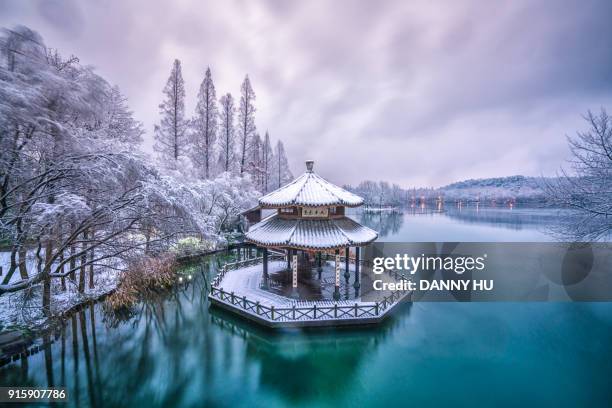 west lake in winter, hangzhou city,china - hangzhou snow stock pictures, royalty-free photos & images