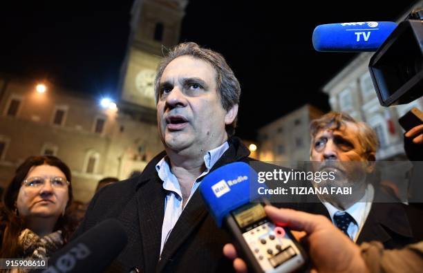 Roberto Fiore leader of far-right group Forza Nuova speaks to media during an unauthorised demonstration on February 8, 2018 in Macerata in support...