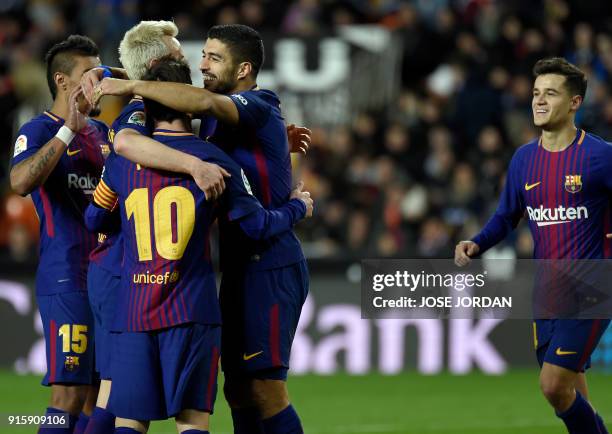 Barcelona's Croatian midfielder Ivan Rakitic celebrates a goal with teammates during the Spanish 'Copa del Rey' second leg semi-final football match...