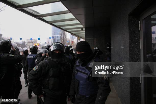 Police forces stand outside the business center &quot;Gulliver&quot;. Few groups of police forces, ARMA and unidentified people seized the office of...
