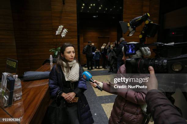 Newspaper &quot;Vesti&quot; editor-in-chief Oksana Omelchenko talks to media in business center hall. Few groups of police forces, ARMA and...