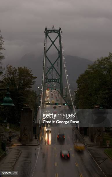 Traffic on Lions Gate Bridge, the connector of downtown and North and West Vancouver, is seen in this 2009 Vancouver, British Columbia, Canada, rainy...
