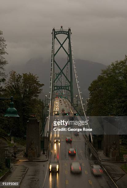 Traffic on Lions Gate Bridge, the connector of downtown and North and West Vancouver, is seen in this 2009 Vancouver, British Columbia, Canada, rainy...