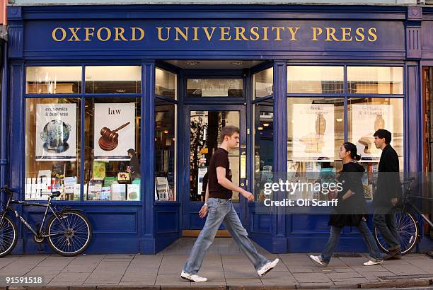 Students walk past the Oxford University Press bookshop as Oxford University commences its academic year on October 8, 2009 in Oxford, England....