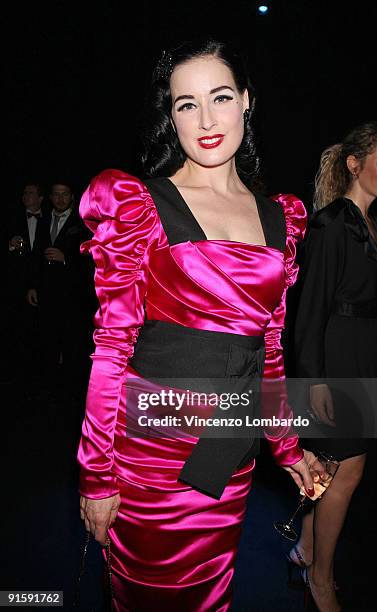 Dita Von Teese attends amfAR Milano 2009 Cocktail Reception, the Inaugural Milan Fashion Week event at La Permanente on September 28, 2009 in Milan,...