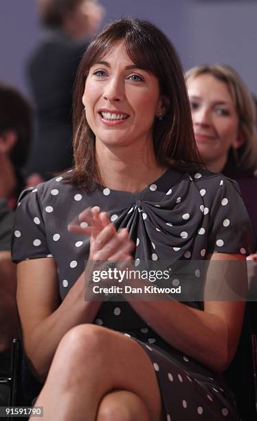 Samantha Cameron watches as her husband David Cameron, leader of the Conservative Party, delivers his keynote speech to delegates on the last day of...