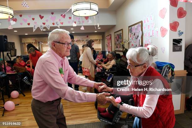 Bob Handwerk dances with his wife, and Chelsea Place resident, Agnes Spino right, as they take part in a pre-Valentine's day dance at Chelsea Place...