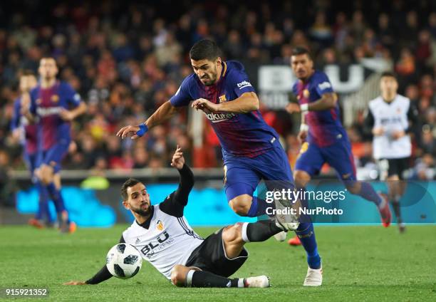 Martin Montoya of Valencia CF and Luis Suarez of FC Barcelona during the spanish Copa del Rey semi-final, second leg match between Valencia CF and FC...