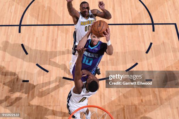 Michael Carter-Williams of the Charlotte Hornets shoots the ball during the game against the Denver Nuggets on February 5, 2018 at the Pepsi Center...