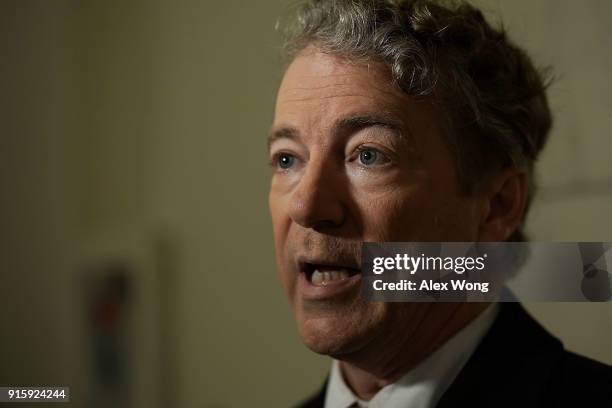 Sen. Rand Paul participates in a TV interview outside his office at Russell Senate Office Building on Capitol Hill February 8, 2018 in Washington,...