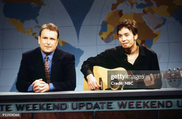 Episode 1 -- Pictured: Colin Quinn, Jimmy Fallon during "Weekend Update" on September 26, 1998 --