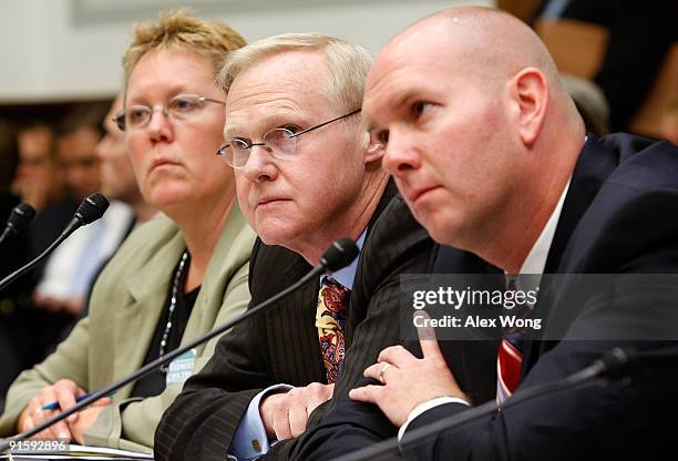 Kathy Miller, board member of the Vermont Grocers' Association; David Evans, lecturer at the University of Chicago Law School; and Mark Caverly of...