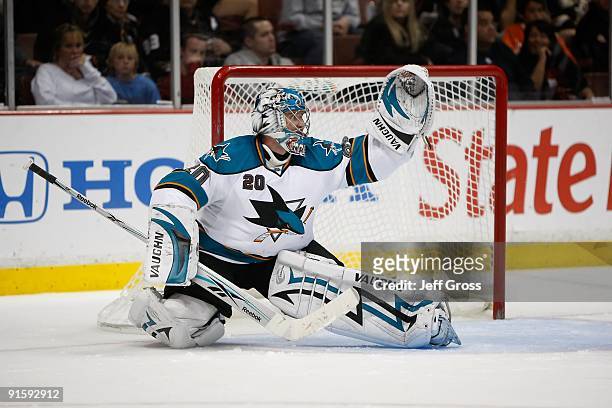 Evgeni Nabokov of the San Jose Sharks makes a save against the Anaheim Ducks at the Honda Center on October 3, 2009 in Anaheim, California. The...