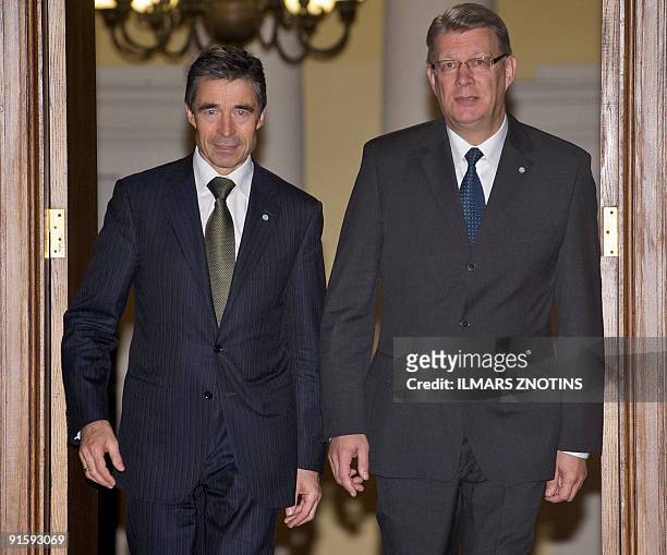 Secretary General Anders Fogh Rasmussen and Latvian President Valdis Zatlers arrive to give a joint press conference on October 8, 2009 in Riga. AFP...