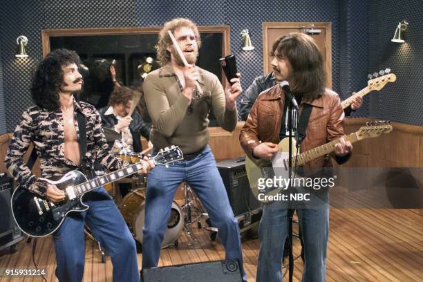 Episode 16 -- Pictured: Chris Kattan as Buck Dharma, Will Ferrell as Gene Frenkle, Chris Parnell as Eric Bloom during "Behind the Music" skit on...