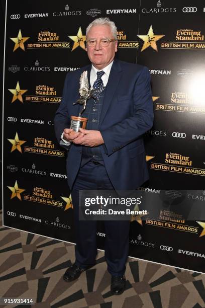 Gary Williamson poses with the Technical Achievement award for "The Paddington 2" at the London Evening Standard British Film Awards 2018 at...