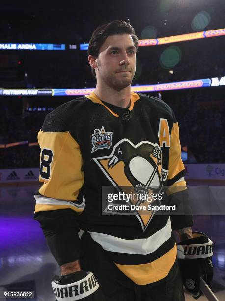 Kris Letang of the Pittsburgh Penguins stands on the ice during player introductions prior to the 2018 GEICO NHL All-Star Skills Competition at...