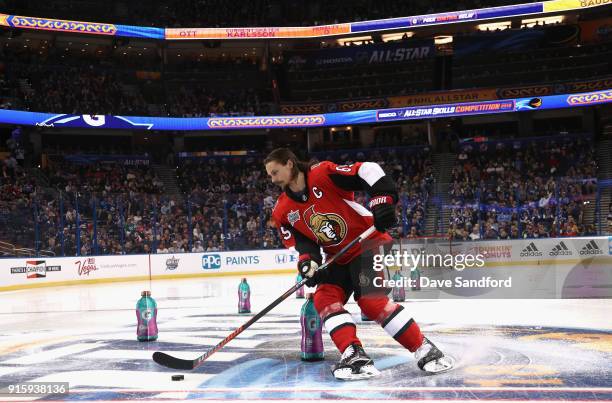 Erik Karlsson of the Ottawa Senators competes in the Gatorade NHL Puck Control Relay during 2018 GEICO NHL All-Star Skills Competition at Amalie...