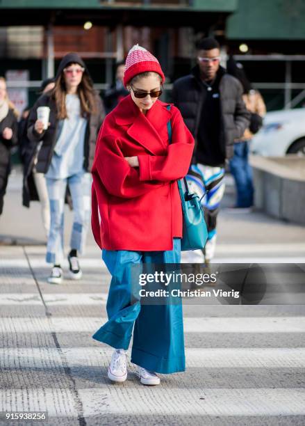 Jenny Walton wearing red coat, wide leg pants seen outside Creatures of Comfort on February 8, 2018 in New York City.