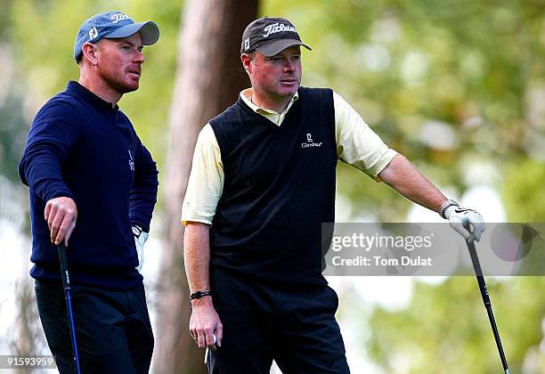 Adrian Ambler and Aaron Wainwright look on during the SkyCaddie PGA Fourball Championship at Forest Pines Golf Club on October 08, 2009 in Broughton,...