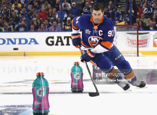 John Tavares of the New York Islanders competes in the Gatorade NHL Puck Control Relay during 2018 GEICO NHL All-Star Skills Competition at Amalie...