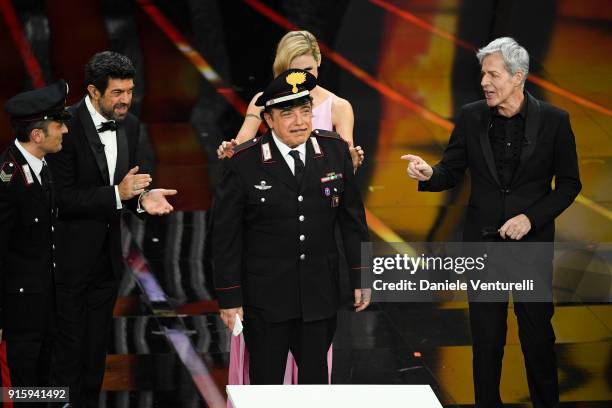 Michelle Hunziker, Nino Frassica and Claudio Baglioni and Pierfrancesco Favino attend the third night of the 68. Sanremo Music Festival on February...