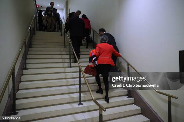 Democratic members of the House of Representatives leave a caucus meeting at the U.S. Capitol February 8, 2018 in Washington, DC. Support from...