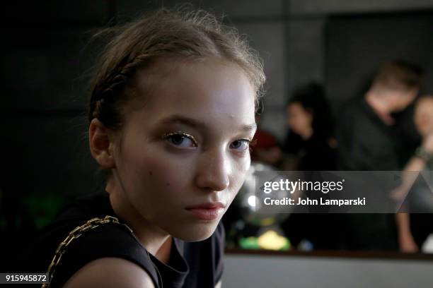 Model prepares backstage for Ulla Johnson during New York Fashion Week: The Shows at Gallery II at Spring Studios on February 8, 2018 in New York...