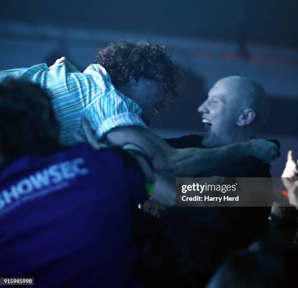 Rob Damiani of Don Broco goes into the crowd as he performs at Pyramids Plaza on February 8, 2018 in Portsmouth, England.